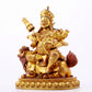 A majestic gilt bronze statue of the King of Treasures