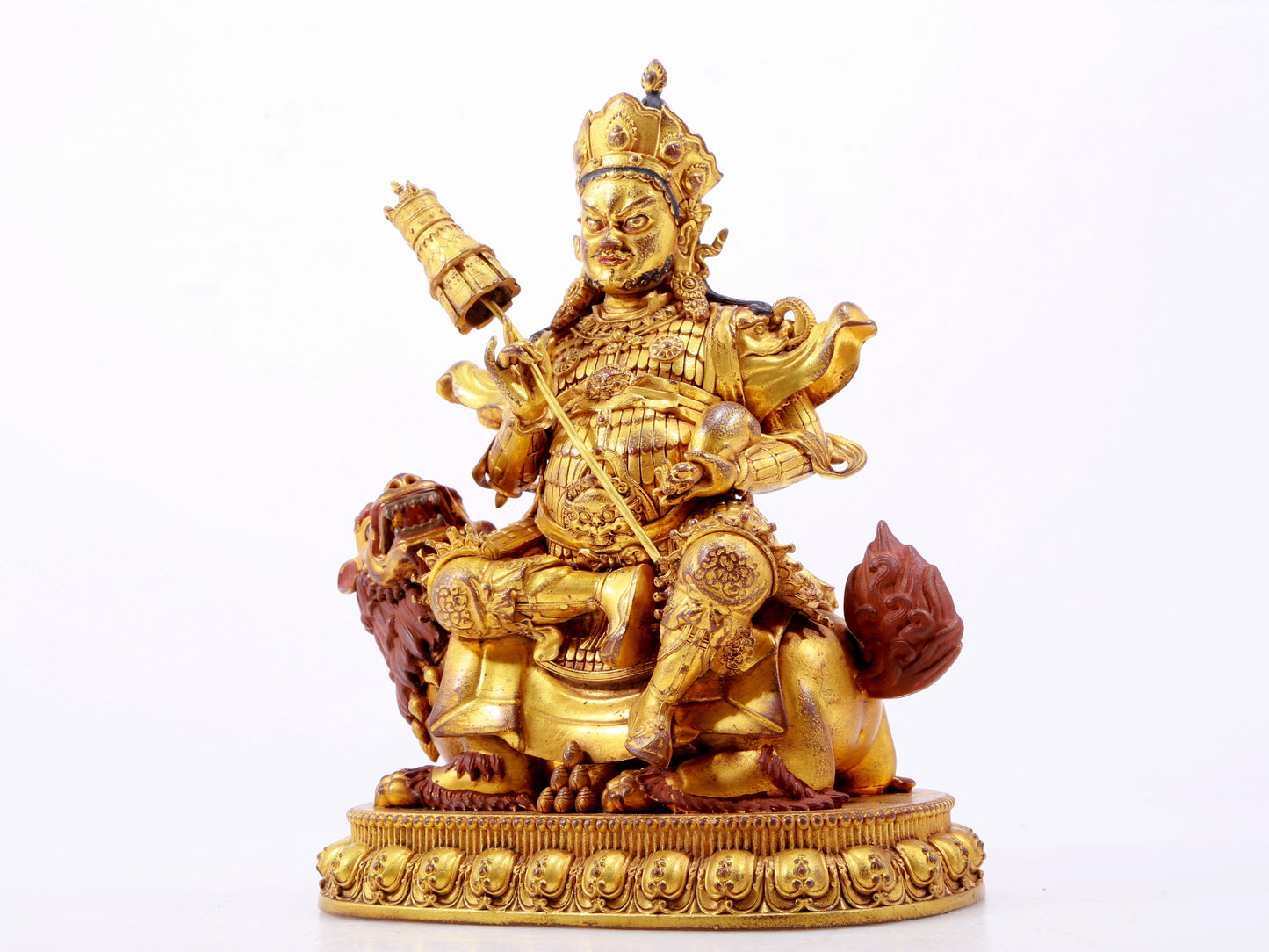 A majestic gilt bronze statue of the King of Treasures