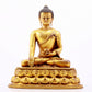 A majestic gilt bronze statue of Sakyamuni