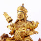 A majestic gilt bronze statue of the King of Treasures