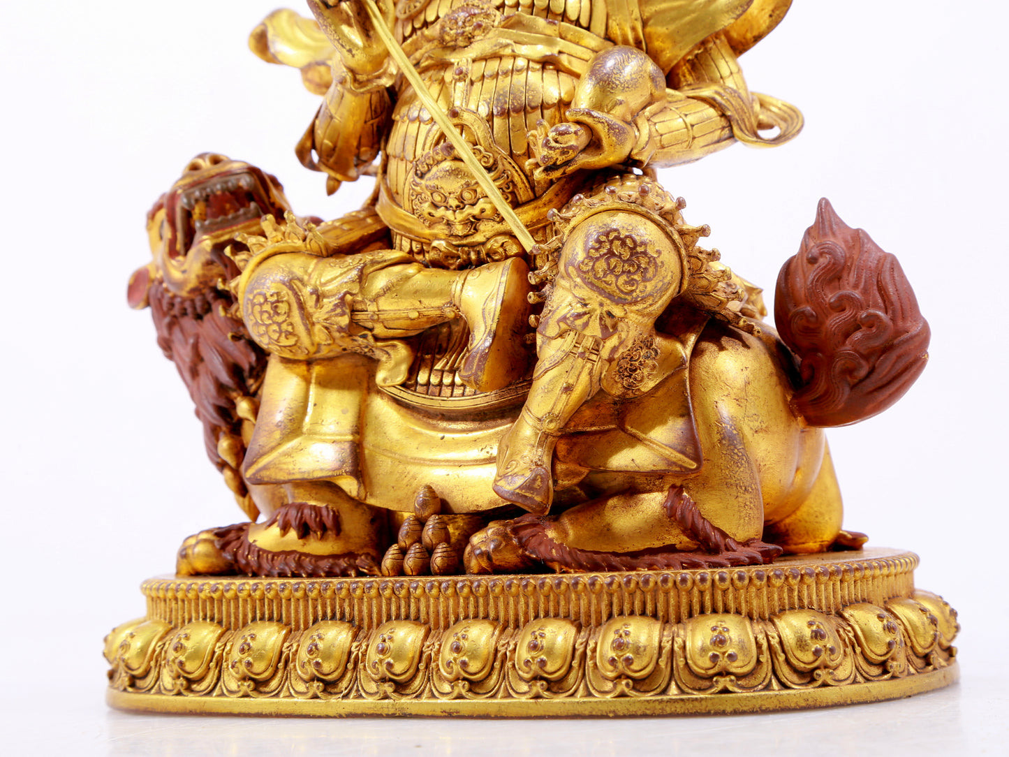 A majestic gilt bronze statue of the King of Treasures