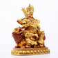 A majestic gilt bronze statue of the King of Treasures