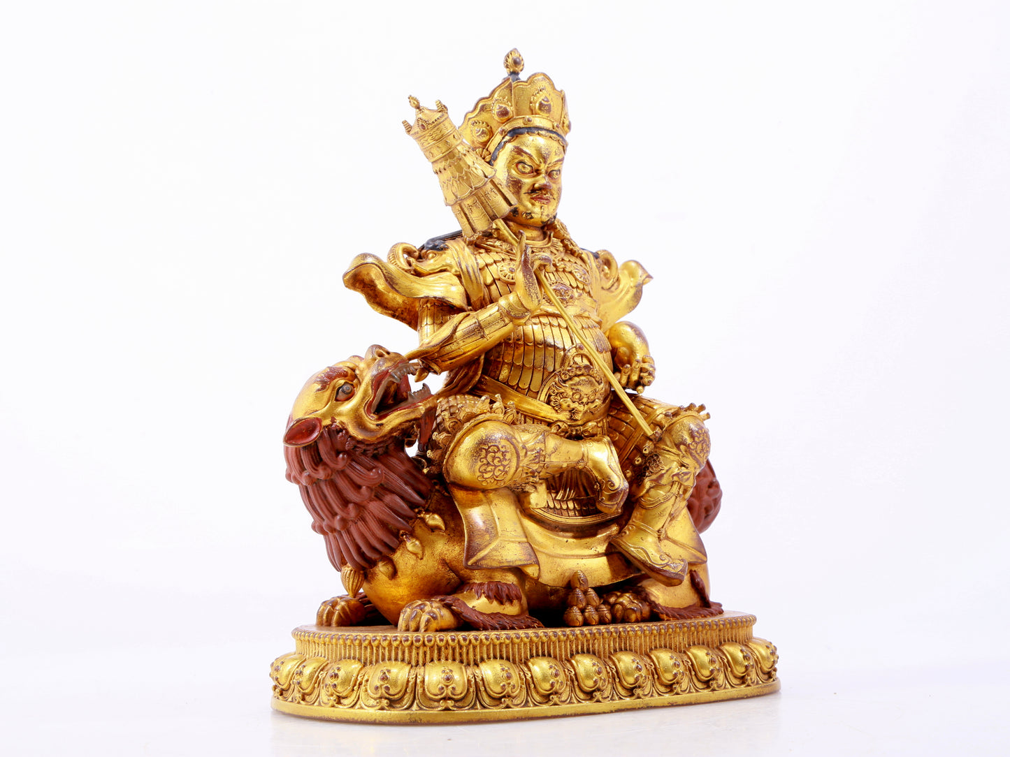 A majestic gilt bronze statue of the King of Treasures