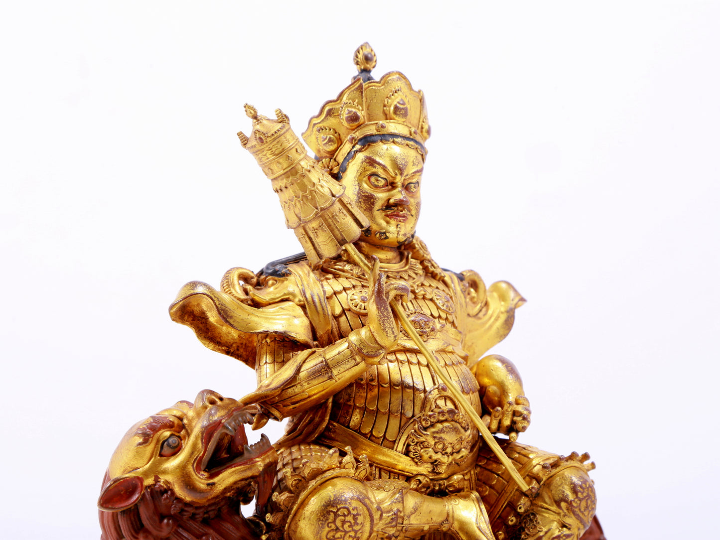 A majestic gilt bronze statue of the King of Treasures