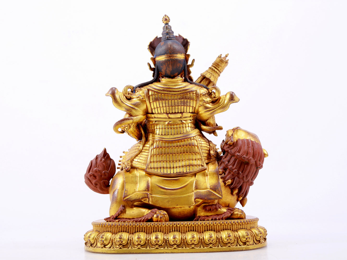 A majestic gilt bronze statue of the King of Treasures