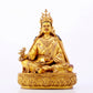 A solemn gilt bronze statue of Padmasambhava