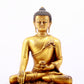 A majestic gilt bronze statue of Sakyamuni