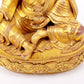 A solemn gilt bronze statue of Padmasambhava