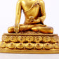 A majestic gilt bronze statue of Sakyamuni