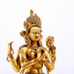 A solemn gilt bronze statue of Guanyin with four arms inlaid with hundreds of treasures