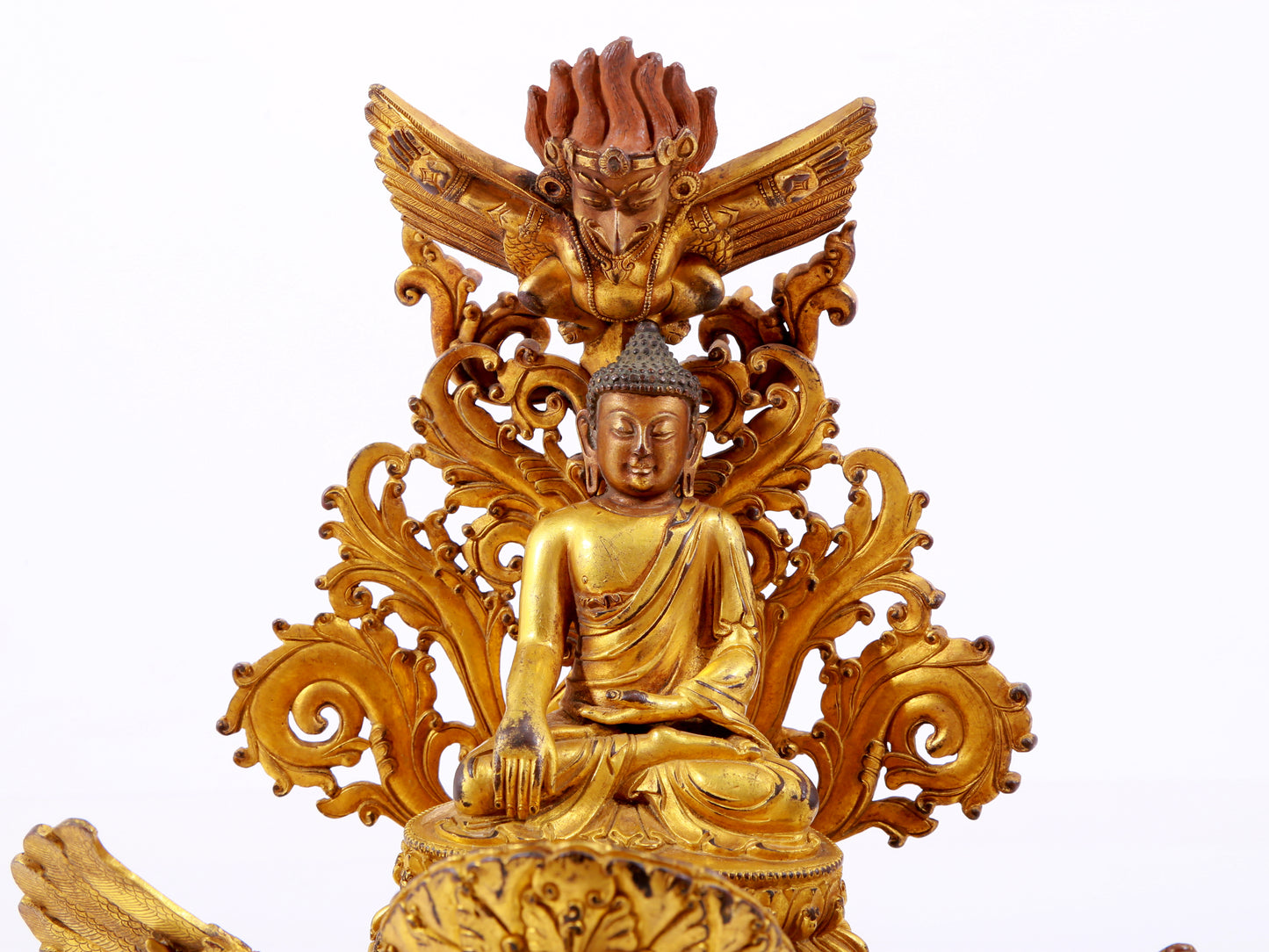 A majestic gilt bronze statue of Sakyamuni