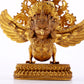 A majestic gilt bronze statue of Sakyamuni