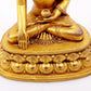 A majestic gilt bronze statue of Sakyamuni