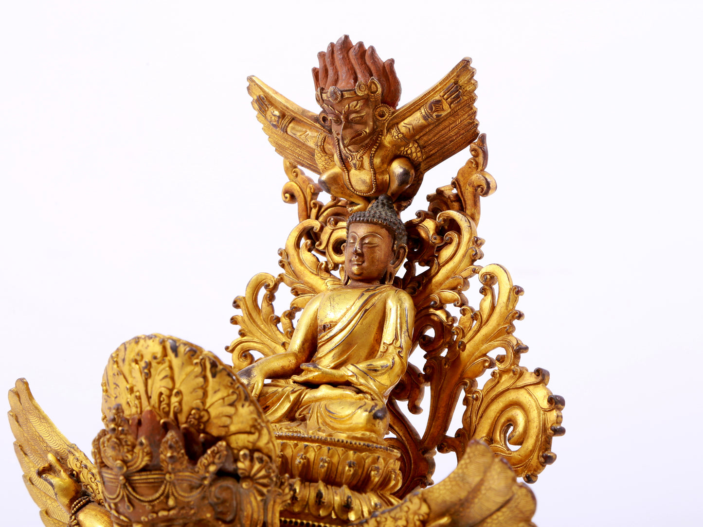 A majestic gilt bronze statue of Sakyamuni