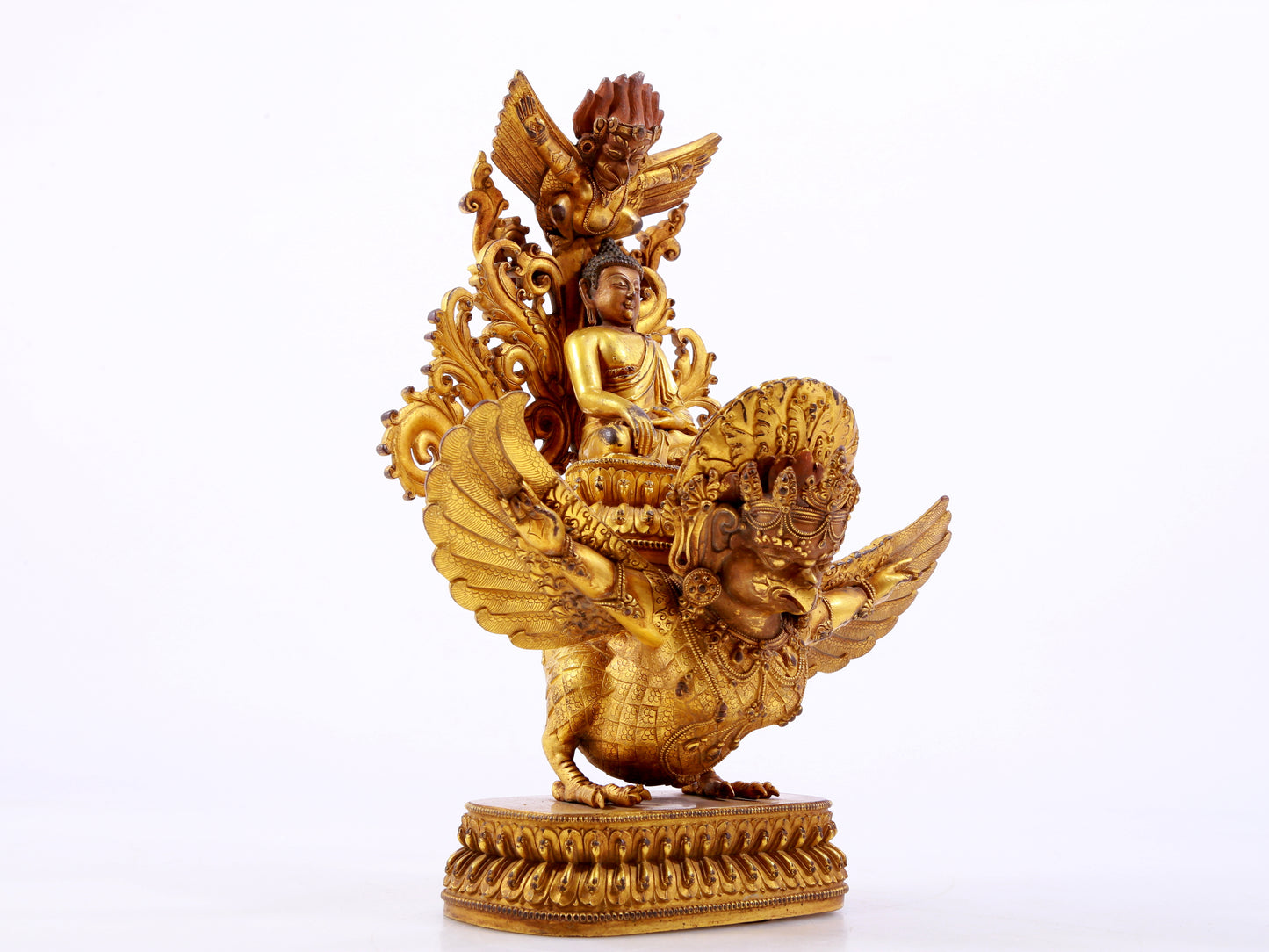 A majestic gilt bronze statue of Sakyamuni