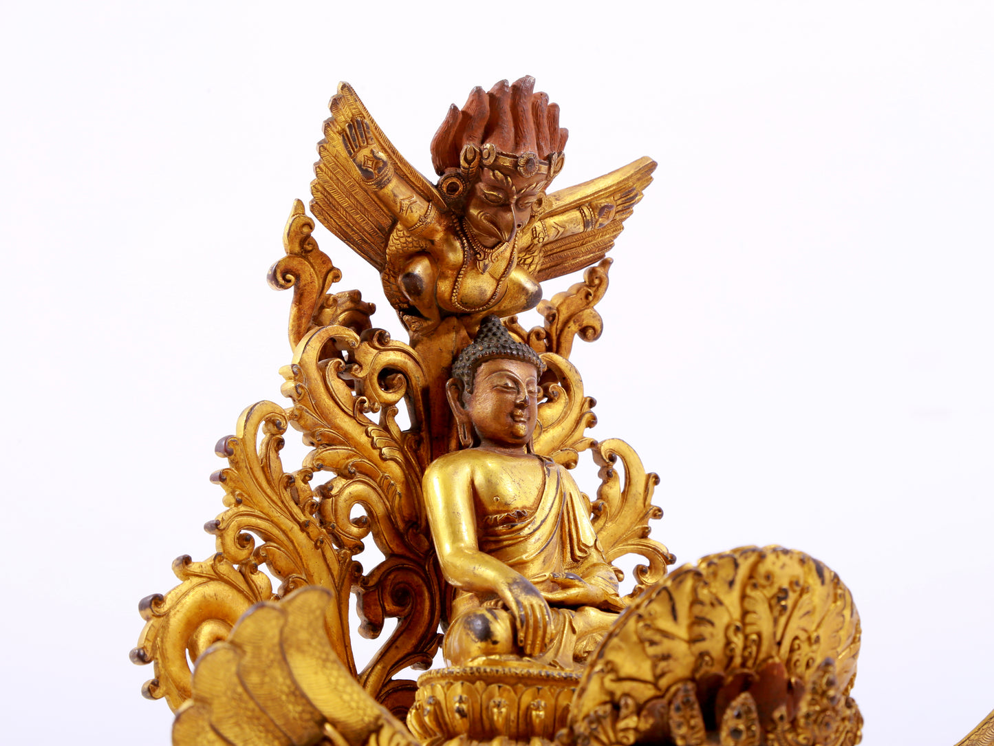 A majestic gilt bronze statue of Sakyamuni