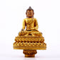 A majestic gilt bronze statue of Sakyamuni