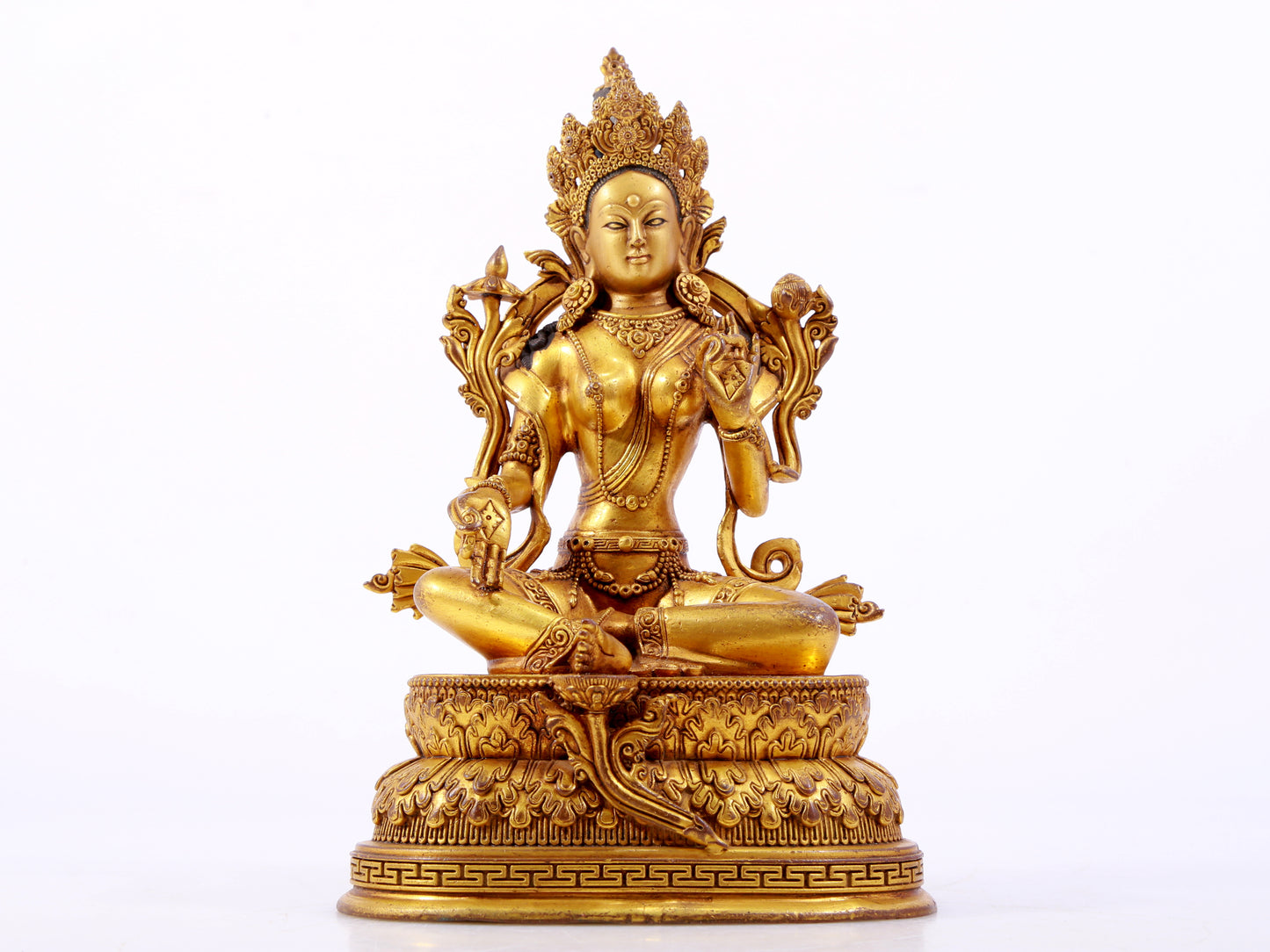 A majestic gilt bronze statue of green Tara