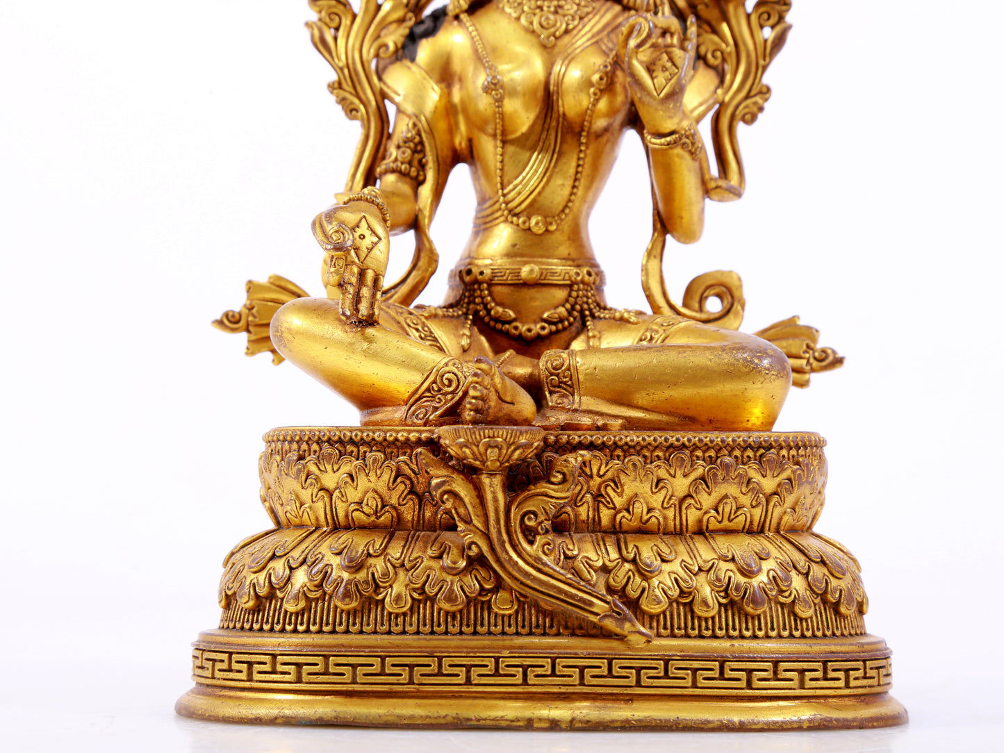 A majestic gilt bronze statue of green Tara