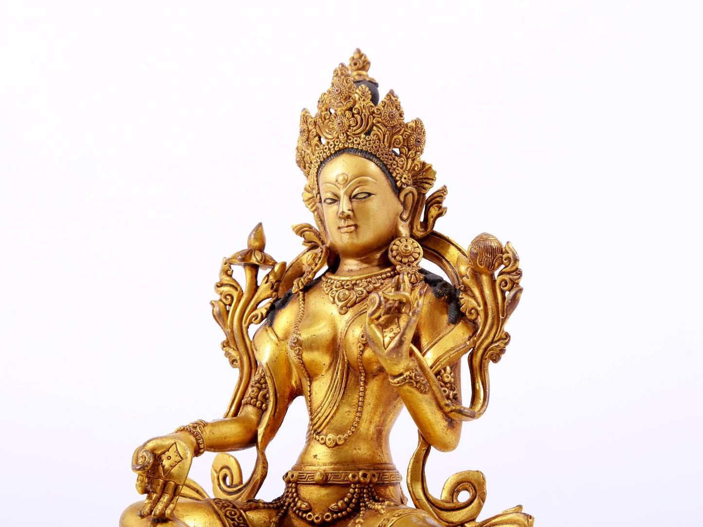 A majestic gilt bronze statue of green Tara