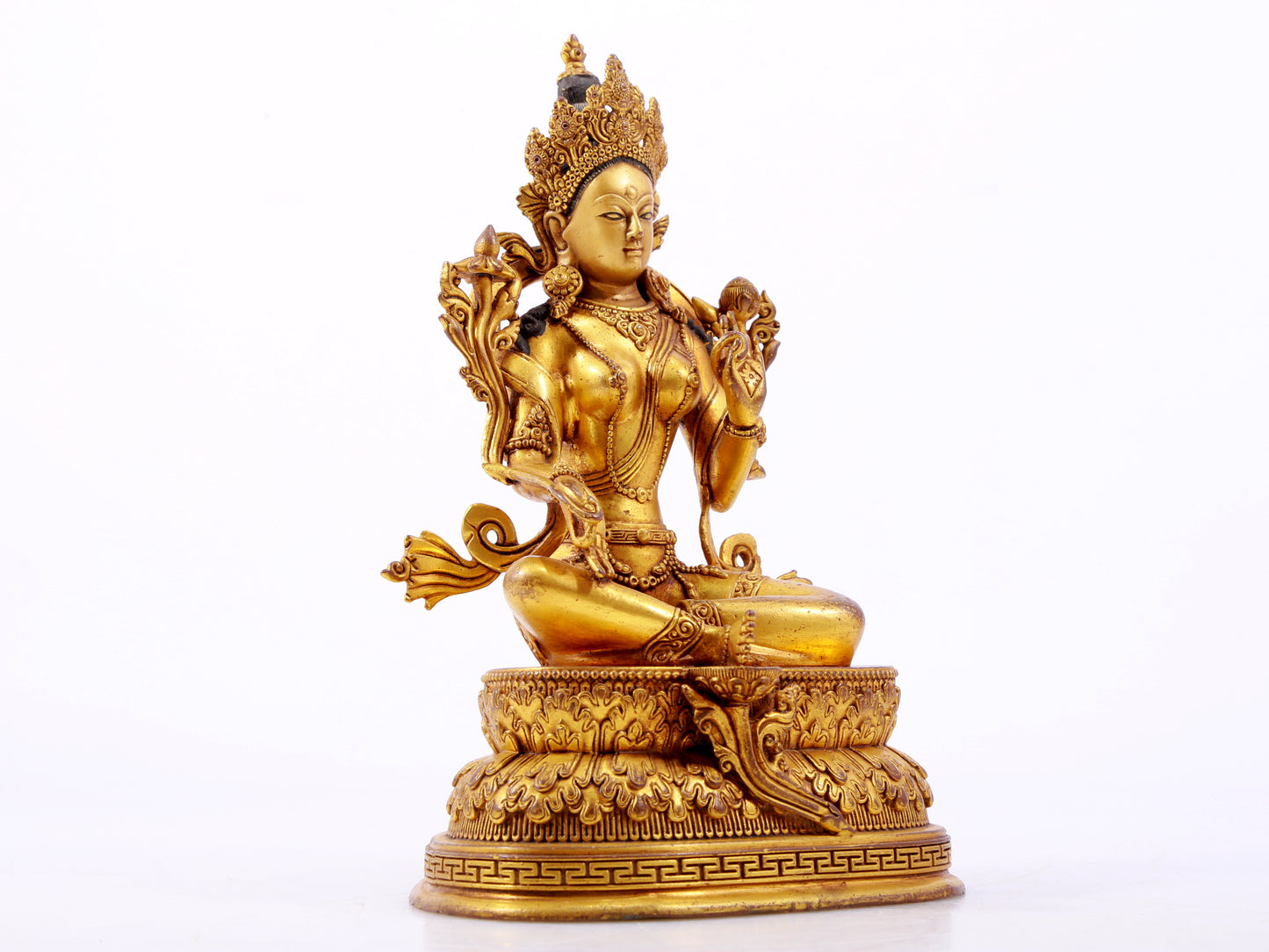 A majestic gilt bronze statue of green Tara