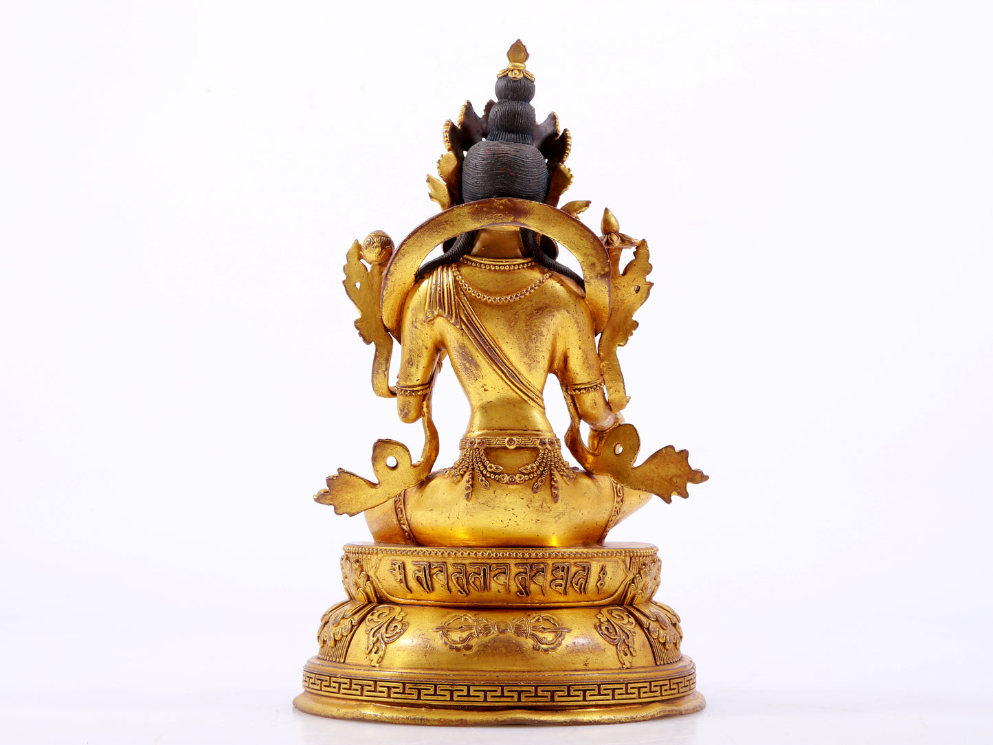 A majestic gilt bronze statue of green Tara