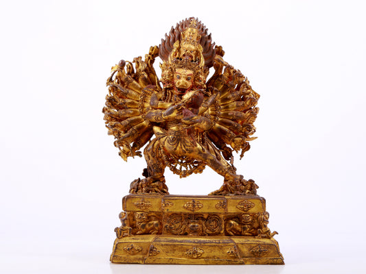 A solemn gilt bronze statue of Yamantaka Vajra