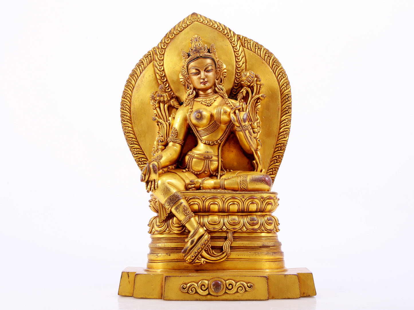 A majestic gilt bronze statue of green Tara