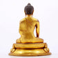 A majestic gilt bronze statue of Sakyamuni