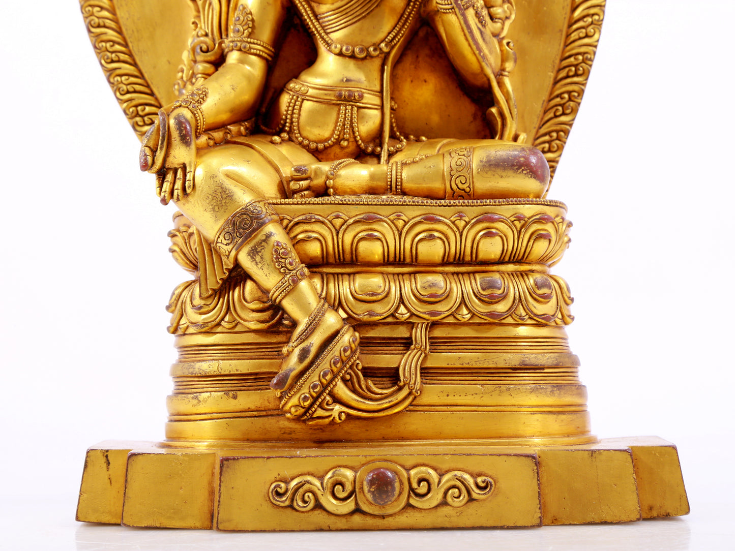 A majestic gilt bronze statue of green Tara