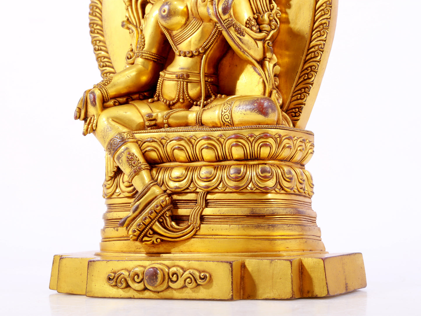 A majestic gilt bronze statue of green Tara