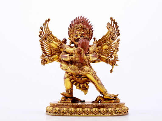 A solemn gilt bronze Vajra statue