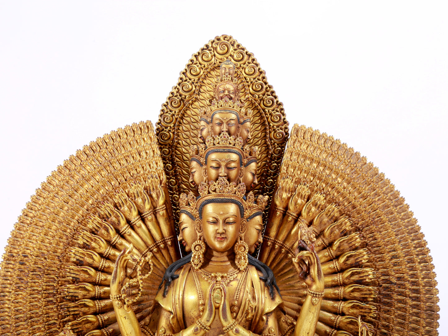 majestic gilt bronze statue of Avalokitesvara with Thousand Arms