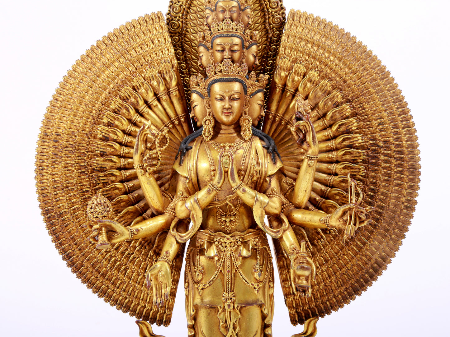 majestic gilt bronze statue of Avalokitesvara with Thousand Arms