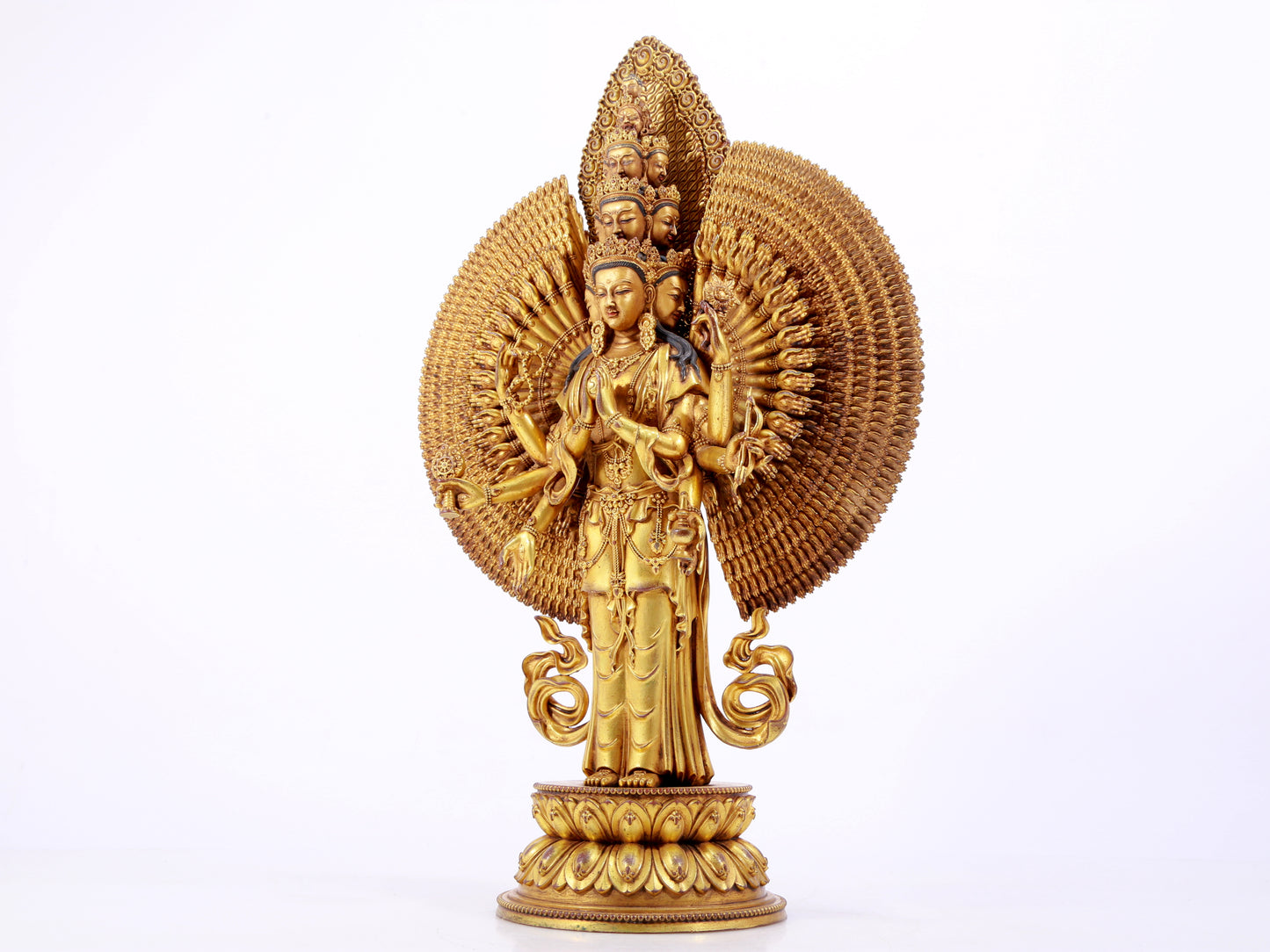 majestic gilt bronze statue of Avalokitesvara with Thousand Arms