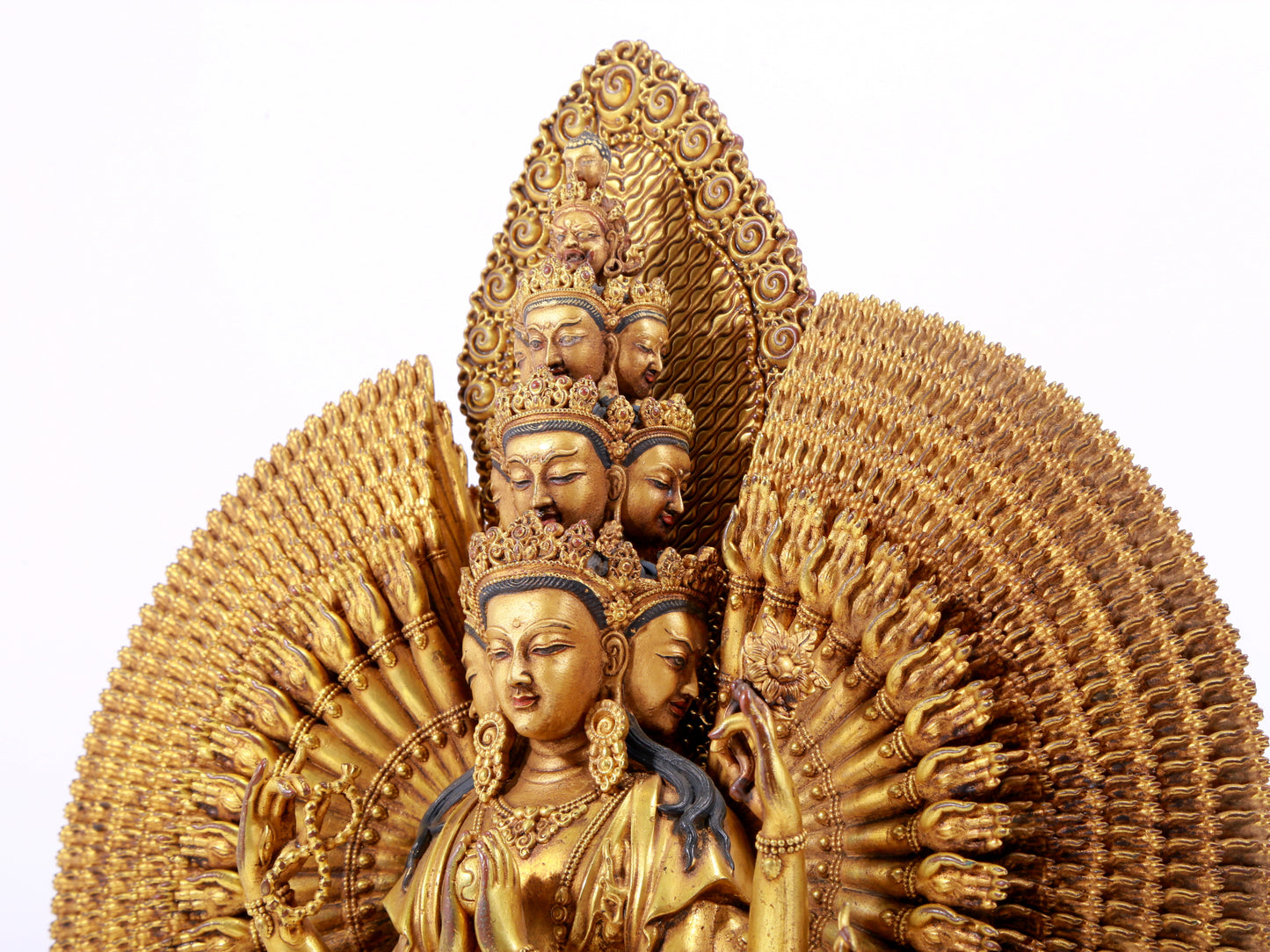 majestic gilt bronze statue of Avalokitesvara with Thousand Arms