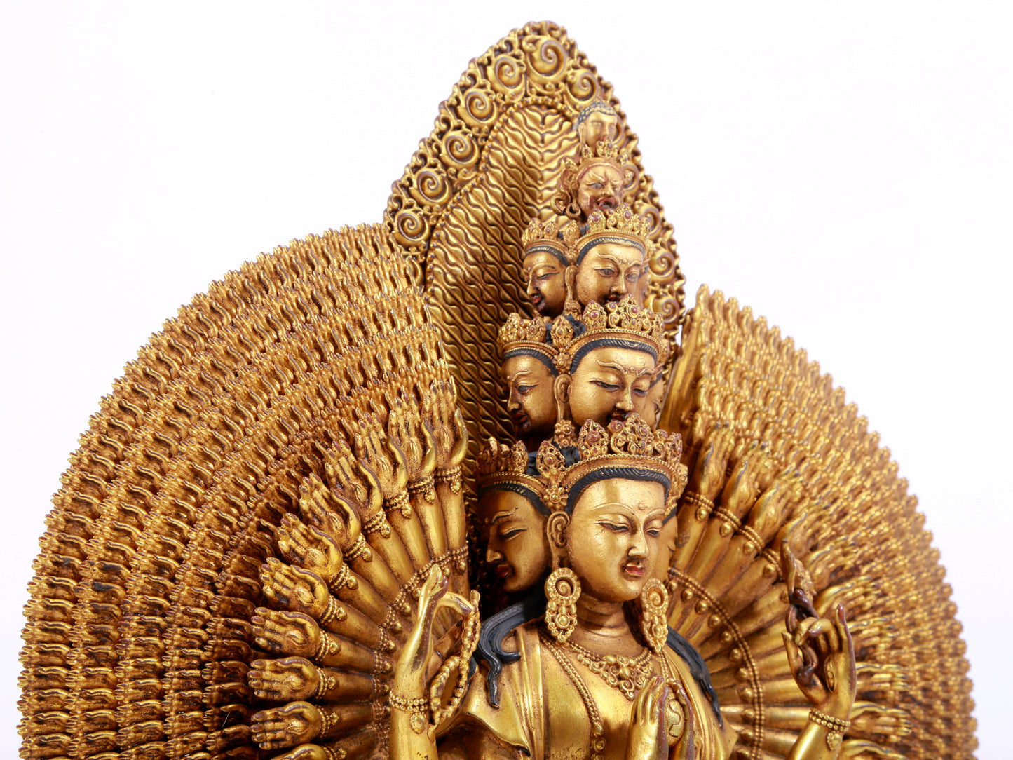 majestic gilt bronze statue of Avalokitesvara with Thousand Arms