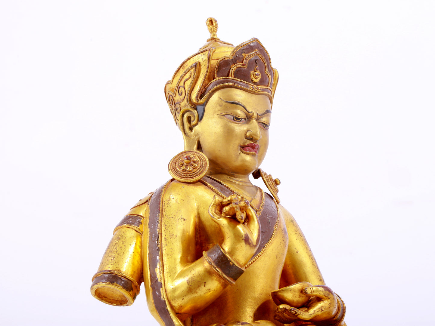 A solemn gilt bronze statue of Bodhisattva