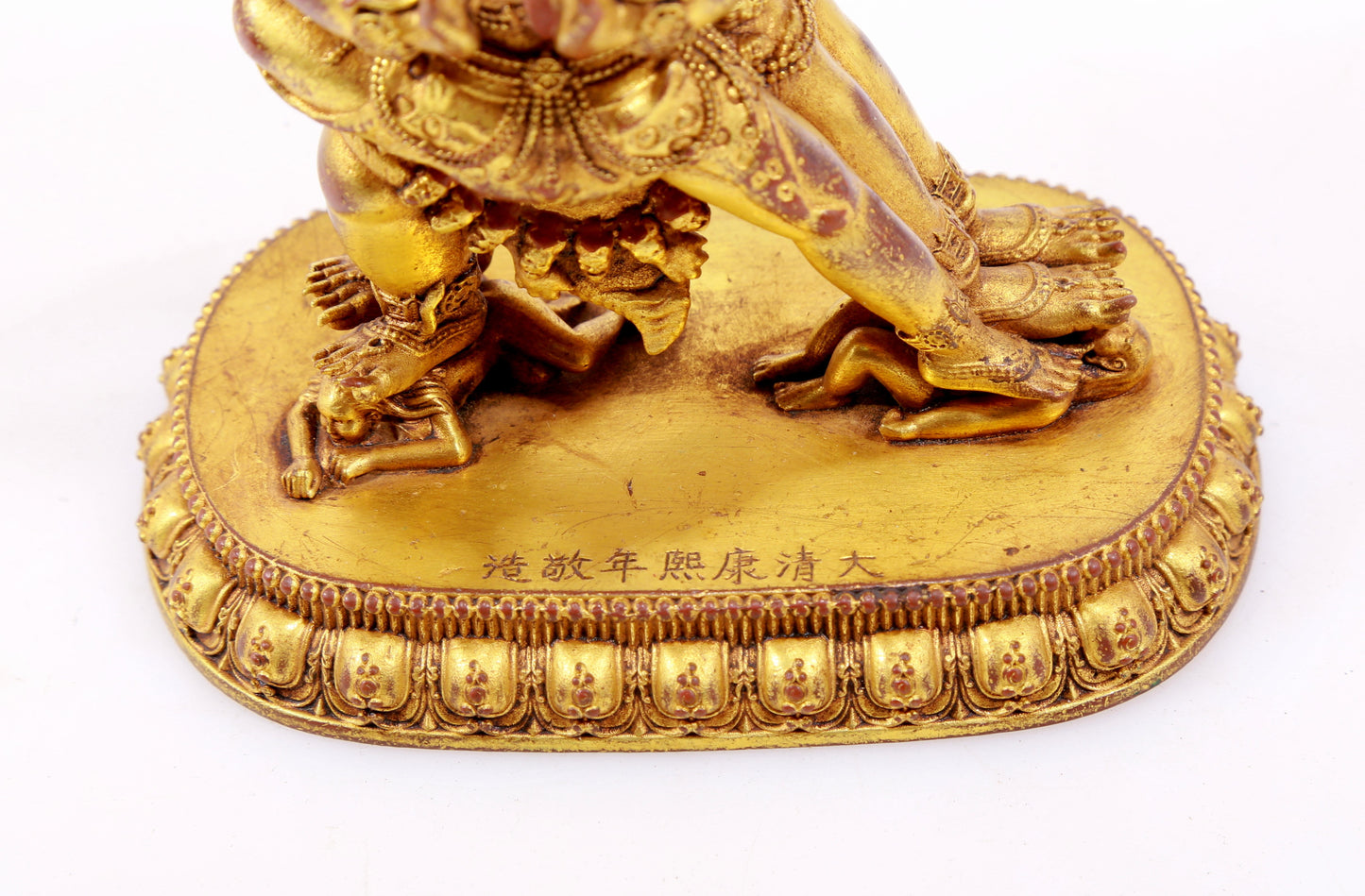 A solemn gilt bronze Vajra statue