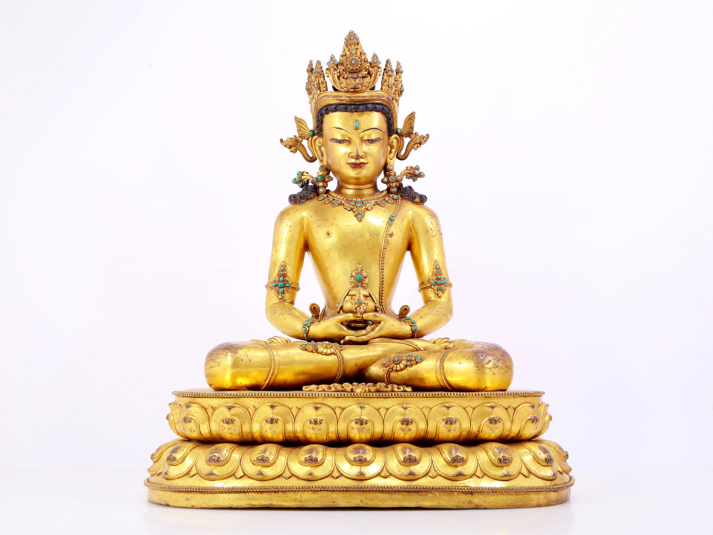 A solemn gilt bronze statue of Amitayus Buddha inlaid with hundreds of treasures