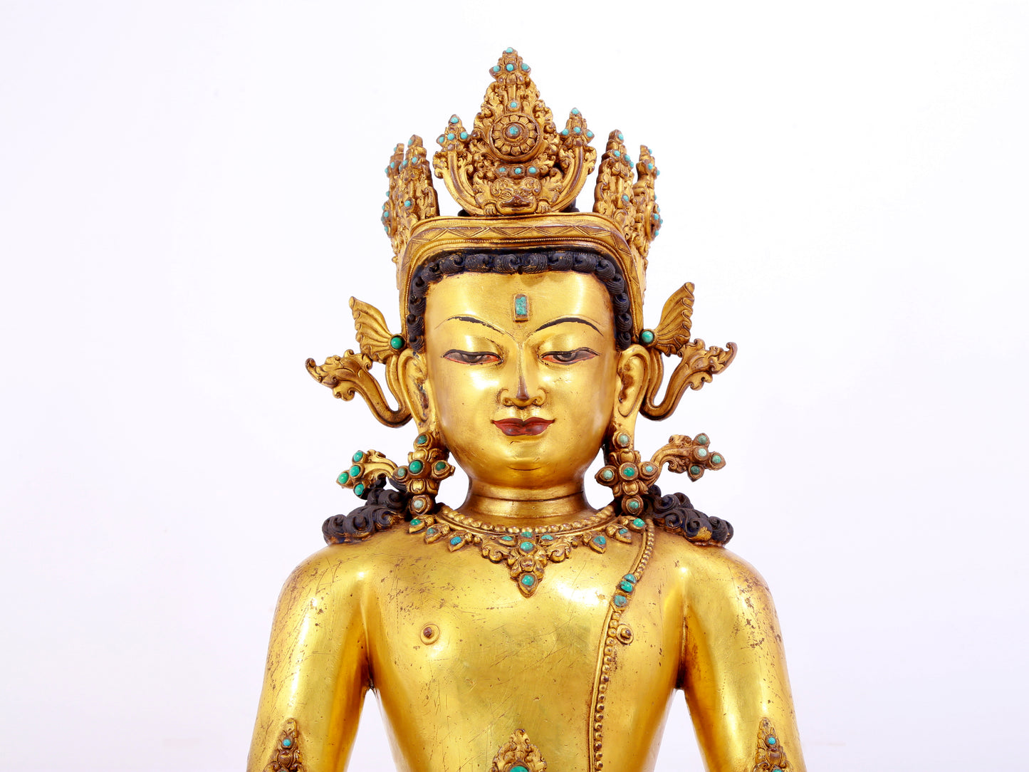 A solemn gilt bronze statue of Amitayus Buddha inlaid with hundreds of treasures