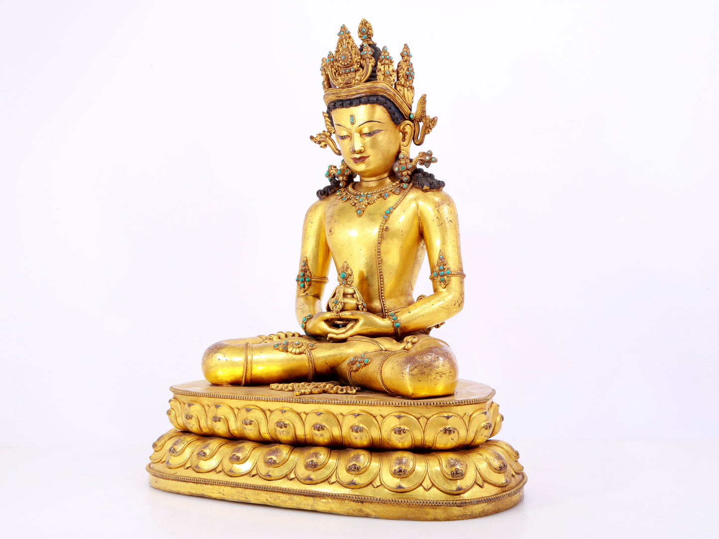 A solemn gilt bronze statue of Amitayus Buddha inlaid with hundreds of treasures