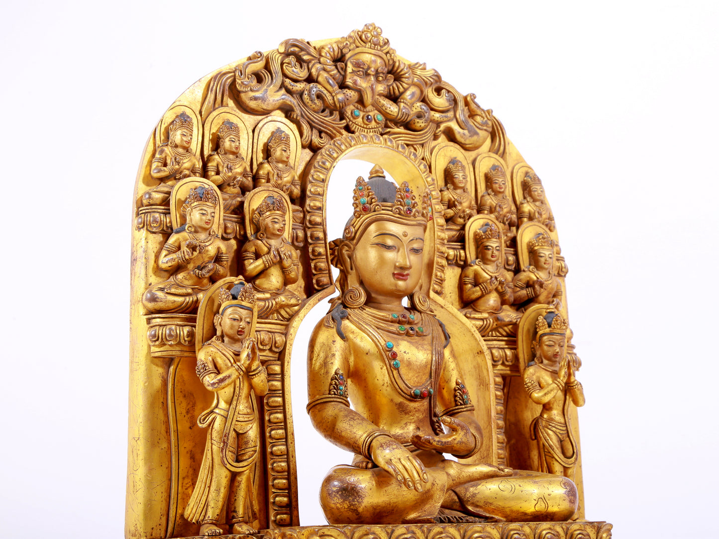 A solemn gilt bronze statue of Bodhisattva inlaid with hundreds of treasures