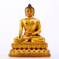 A majestic gilt bronze statue of Sakyamuni