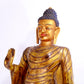 A majestic gilt bronze statue of Sakyamuni