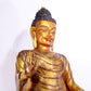 A majestic gilt bronze statue of Sakyamuni