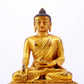 A majestic gilt bronze statue of Sakyamuni