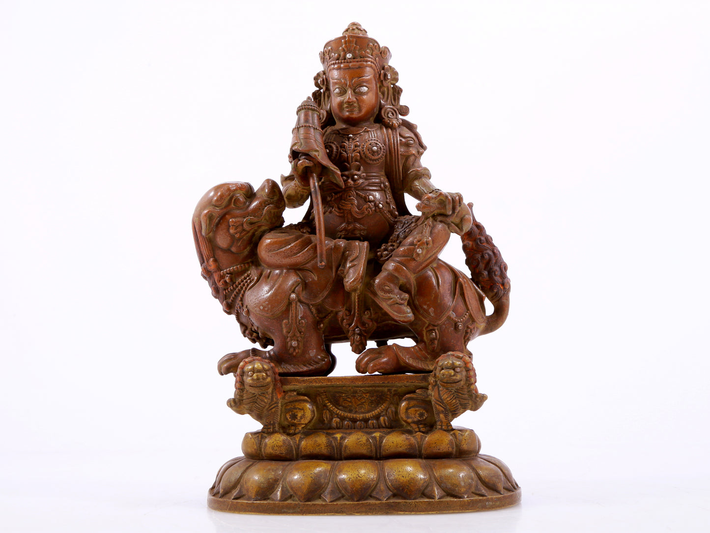 A solemn alloy copper inlaid silver statue of the God of Wealth riding a lion