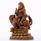 A solemn alloy copper inlaid silver statue of the God of Wealth riding a lion