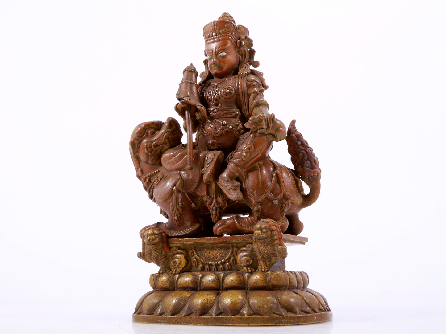 A solemn alloy copper inlaid silver statue of the God of Wealth riding a lion